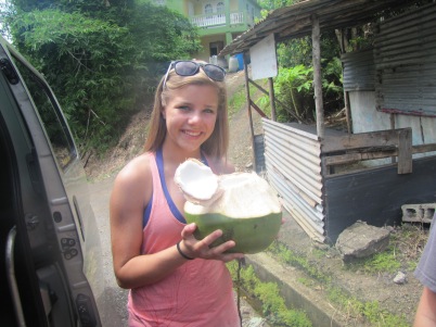 My sister enjoying a coconut.